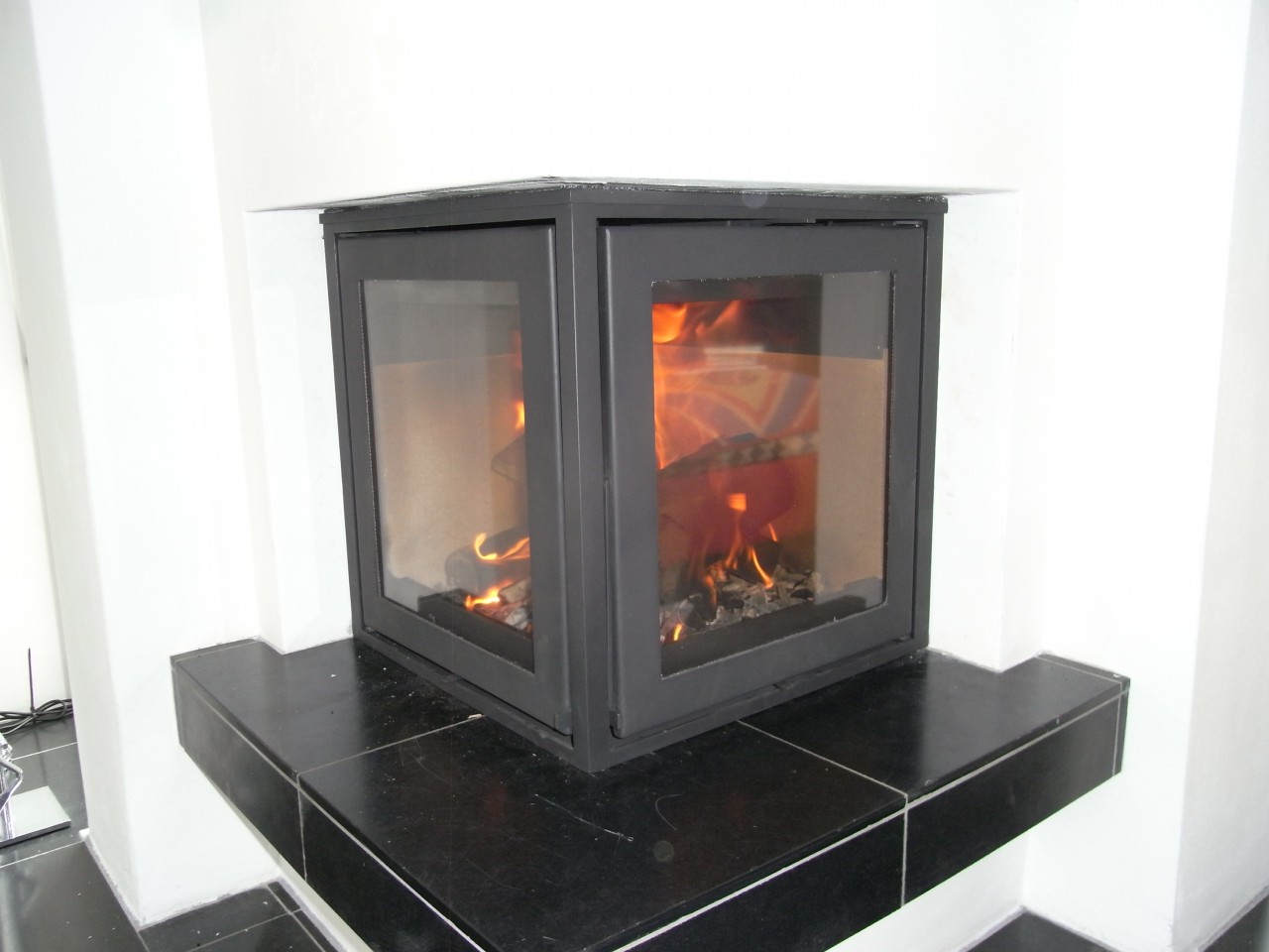 Inzetkachel in bestaande open haard